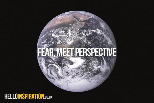 'Fear, Meet Perspective' quote over picture of the Earth from space