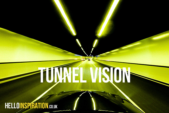 A car driving through a tunnel at night with 'Tunnel Vision' quote