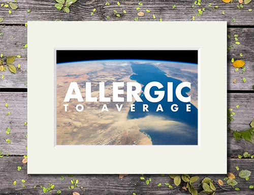 Earth landscape from space with 'Allergic to Average' quote