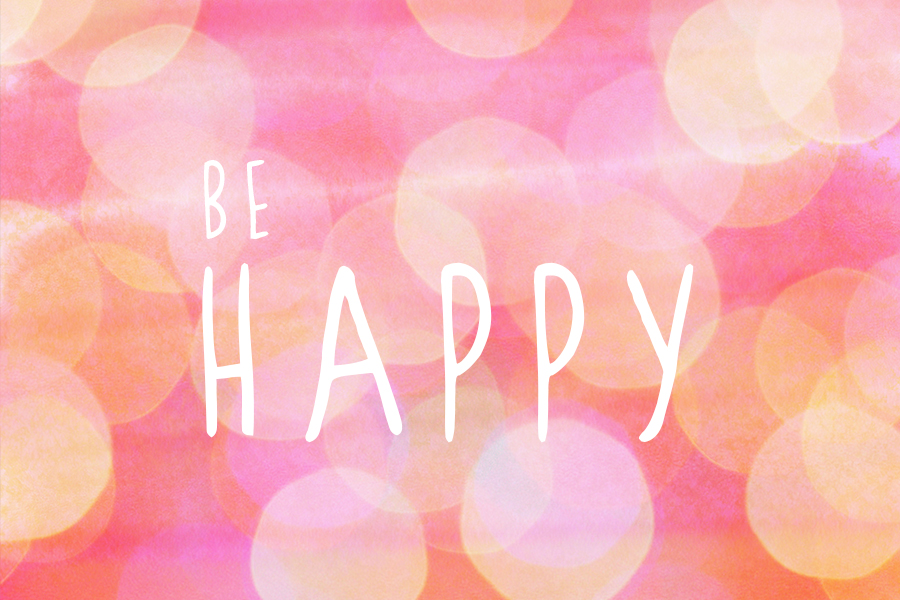 Pink blurred abstract bokeh background with 'Be Happy' quote