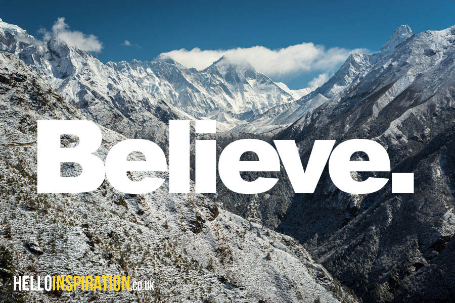 Snowy mountains with 'Believe' quote