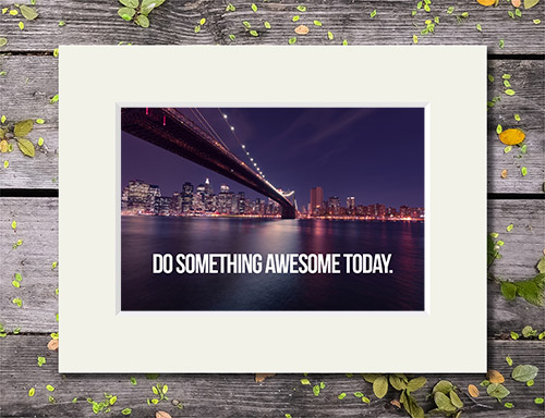 Cityscape with bridge over river with 'Do Something Awesome Today' quote