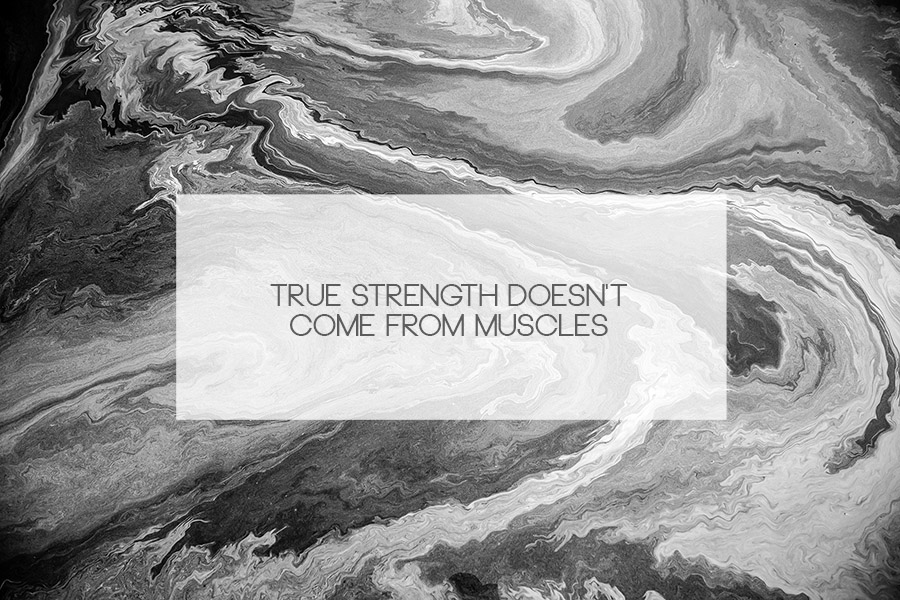 Abstract black and white image with 'True Strength Doesn't Come From Muscles' quote